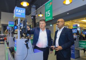 Christophe Orect, Regional Director- East Africa Majid Al Futtaim Retail with Rasheed Muhamed Country CCO Manager demonstrating first self-checkout service at Carrefour Westgate shopping mall.